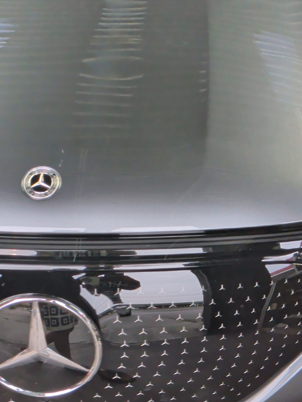 Mercedes EQE badge and exterior panel detail