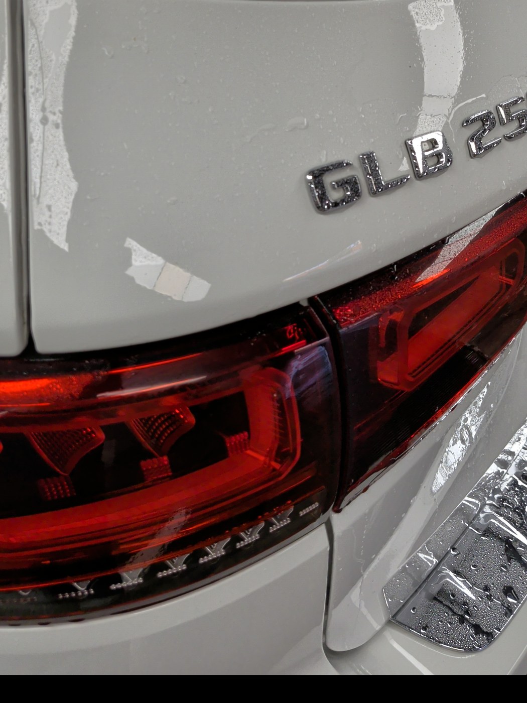 Mercedes GLB 250 badge and taillight detail, finished