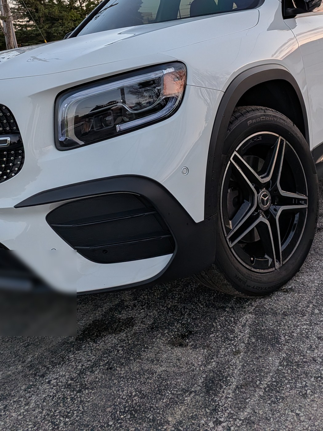 White Mercedes GLB 250 front three-quarter, finished and dry